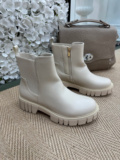 India: Cream chunky chelsea boots. Sizes 3-8