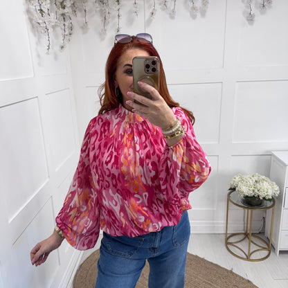 Holly: Pink & orange leopard print top. One size: 12-18