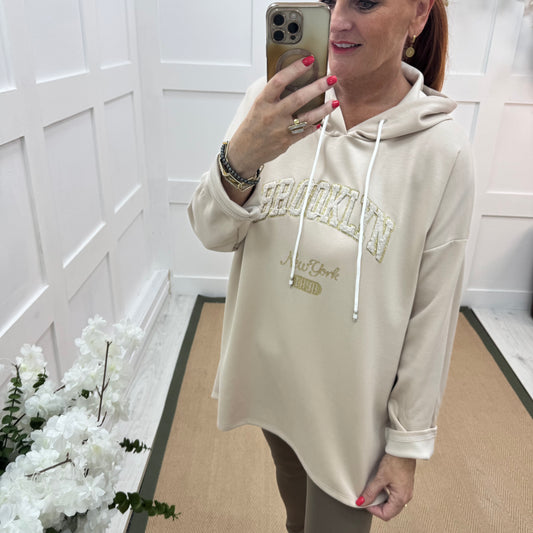 Madison: Cream Brooklyn logo hoodie. One size: 12-18