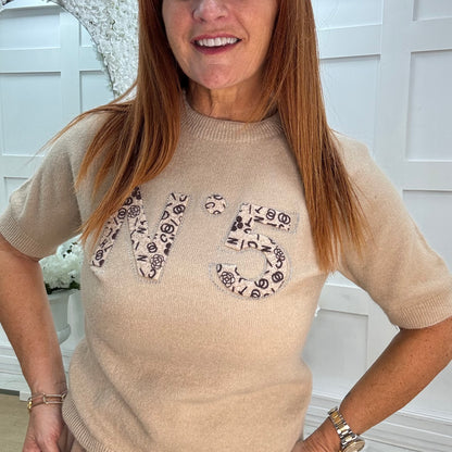 Chantelle: Cream No 5 logo knit top. One size: 10-16