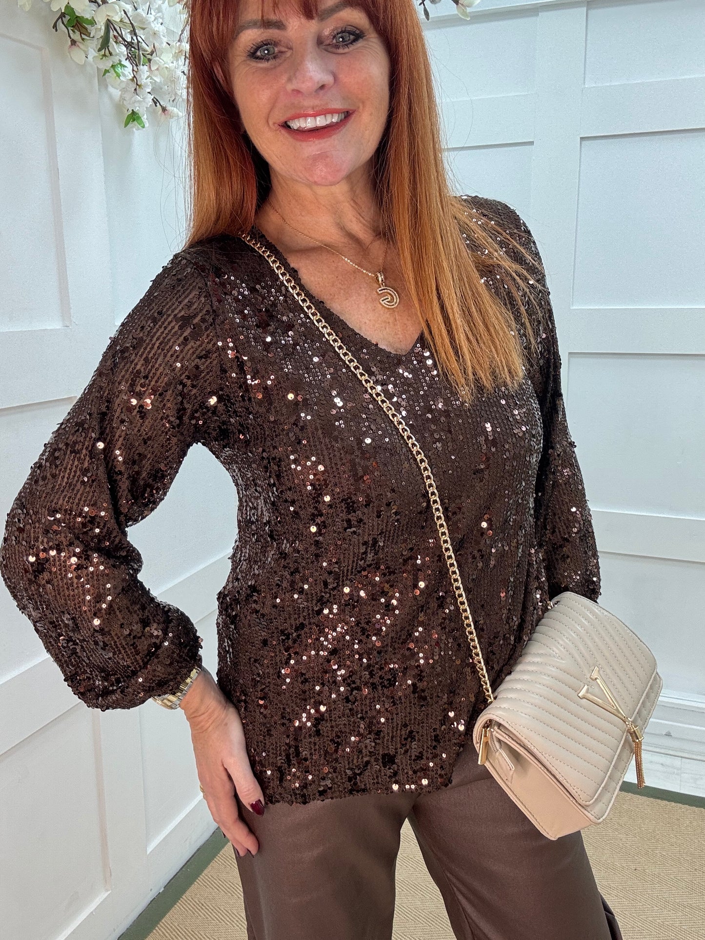 Sutton: Brown v-neck sequin top. One size: 12-16