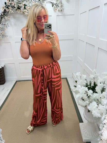 Tanaya: Printed wide leg trousers with belt. One size: 10-16. 4 colours