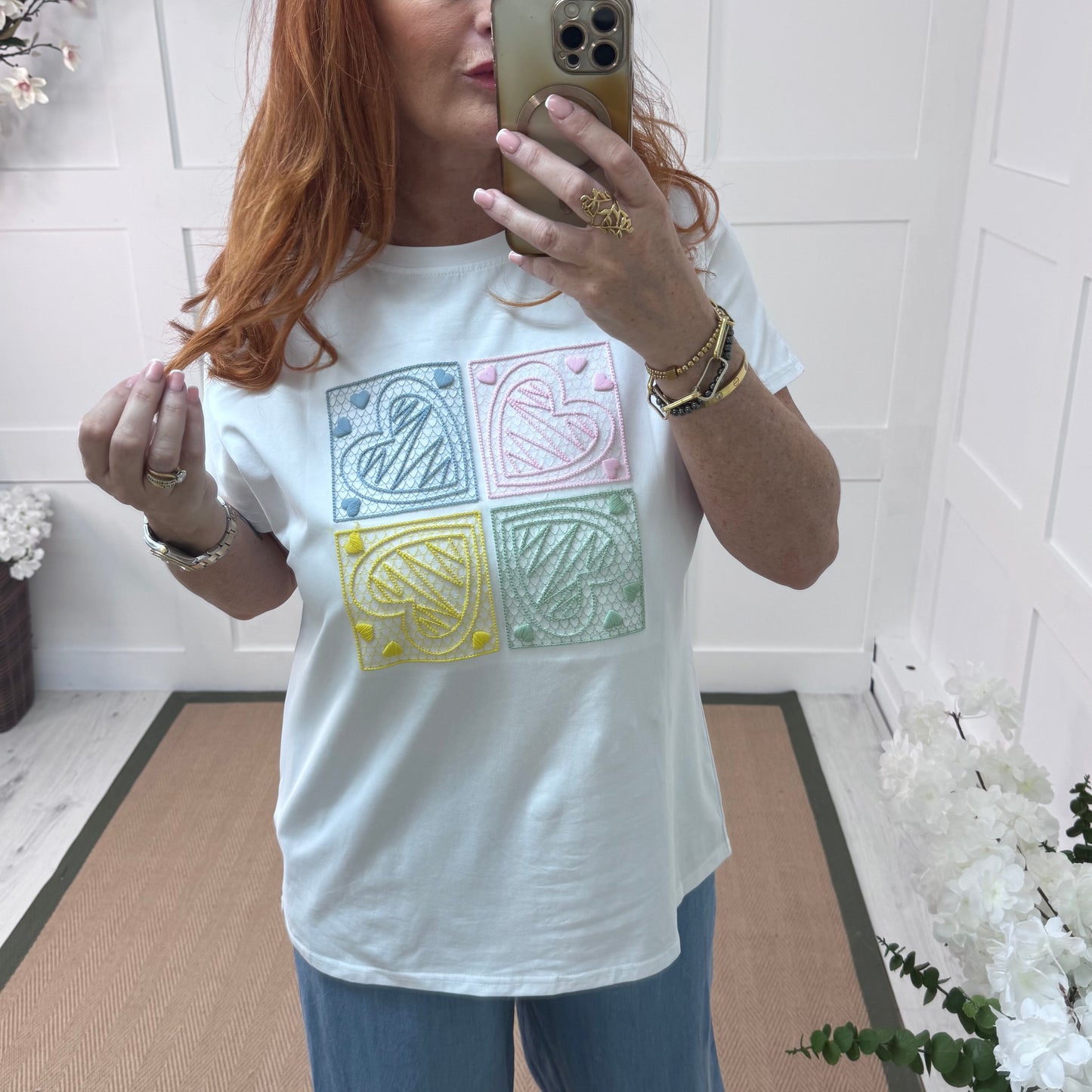 Sophie: White embroidered blue heart T shirt. One size 14-18