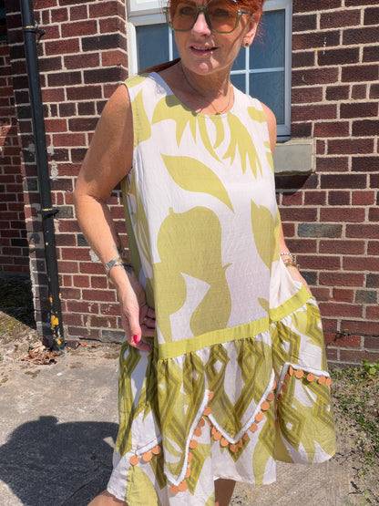 Molly: Leaf printed midi dress with large disc detail. One size: 12-18. 2 colours