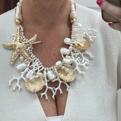 Anais: Chunky white coral & gold starfish necklace