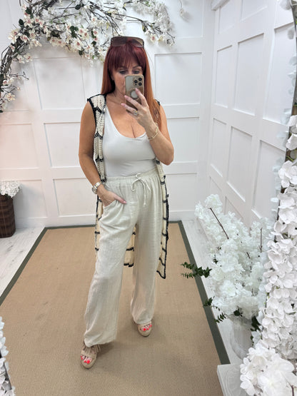Tori: Cream cotton wide leg trousers. One size: 8-16