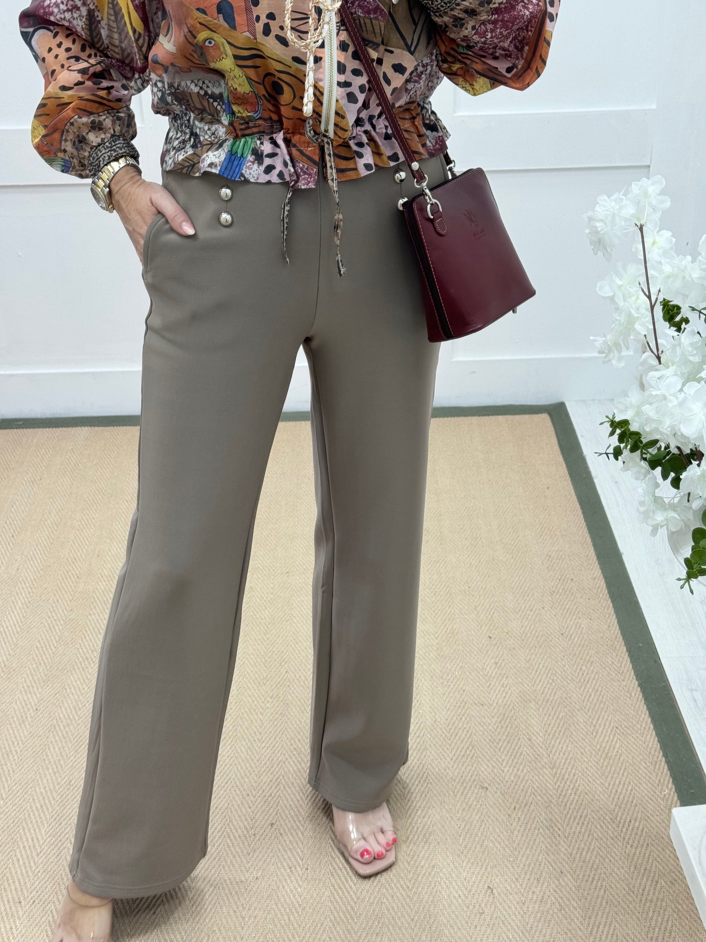 Paris: Taupe stretchy silver button trousers. 4 sizes