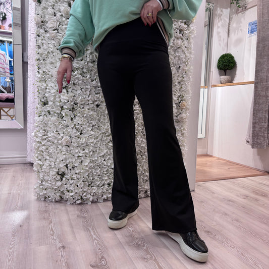 Alexis: Black tummy control flared pants. 3 sizes