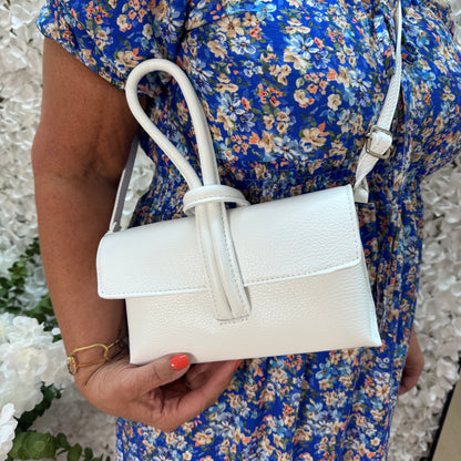 Alexis: White leather loop handle cross body/clutch bag.