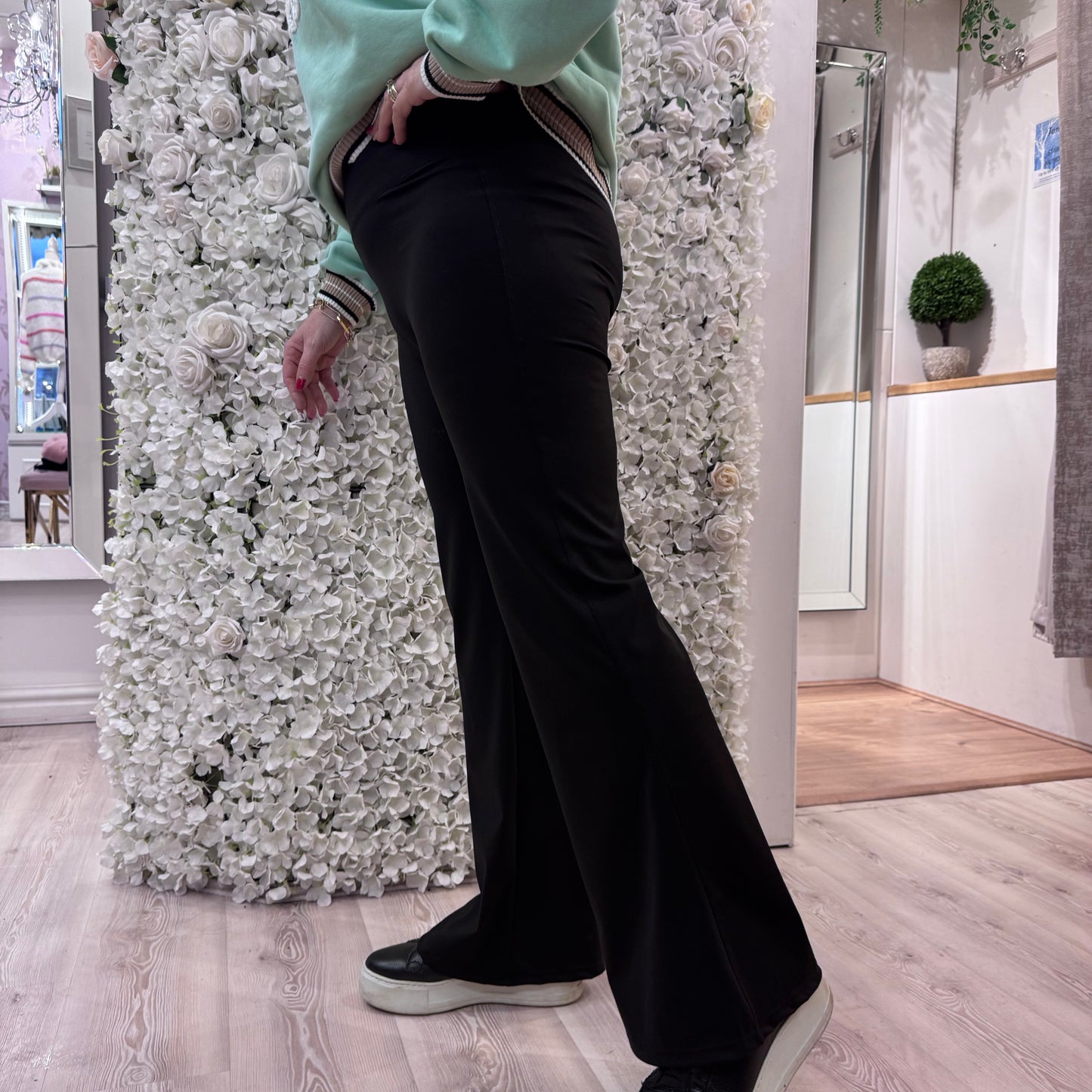 Alexis: Black tummy control flared pants. 3 sizes