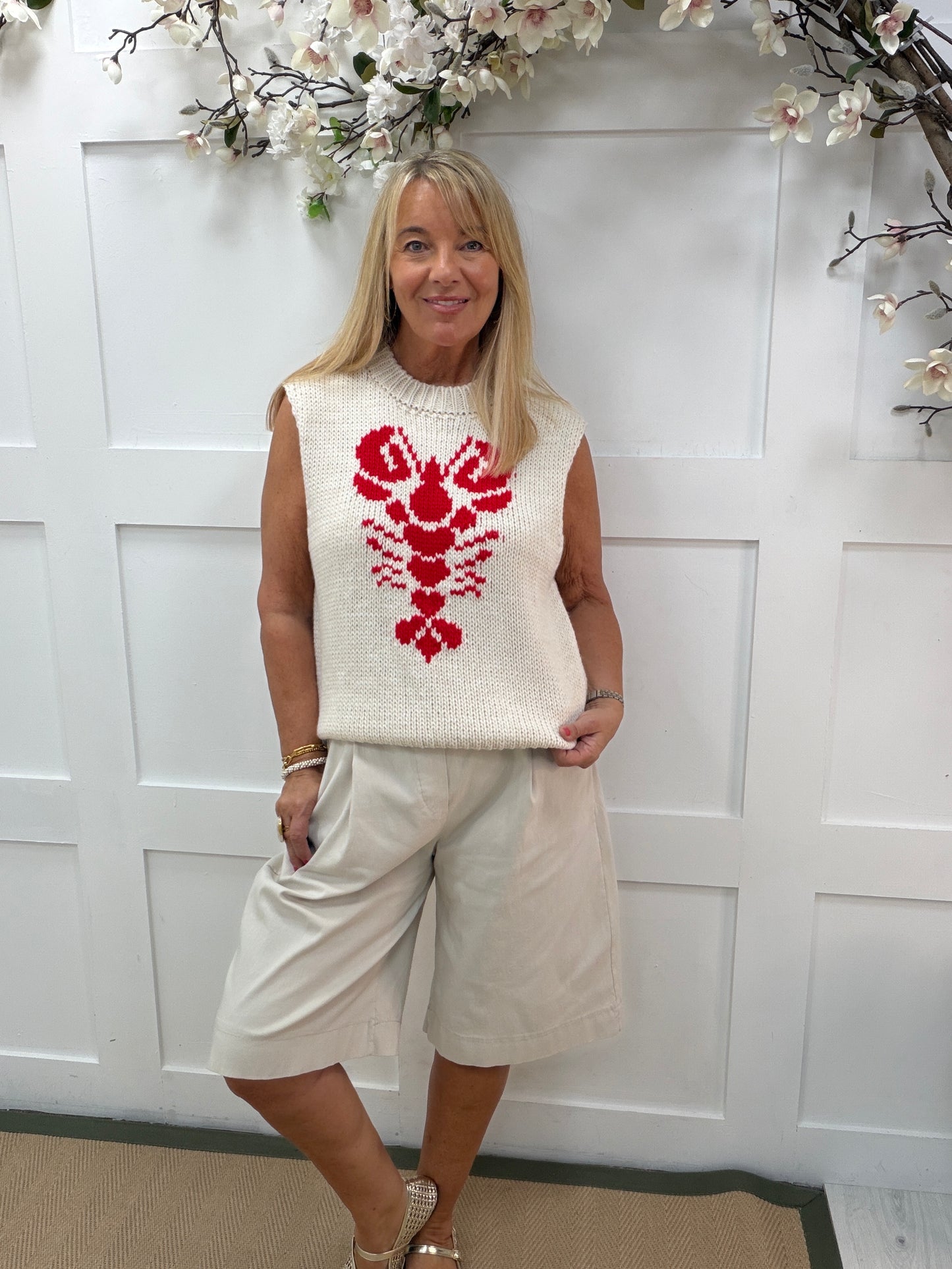 Larrie: Sleeveless lobster soft knit top. One size: 14-18. 2 colours