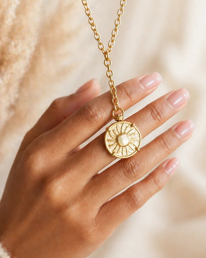 Elara: Gold sun & moon pendant necklaces