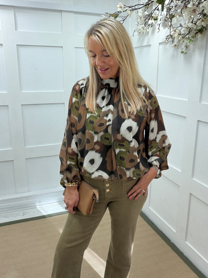 Perri: High neck printed blouse. One size: 12-18. 3 colours