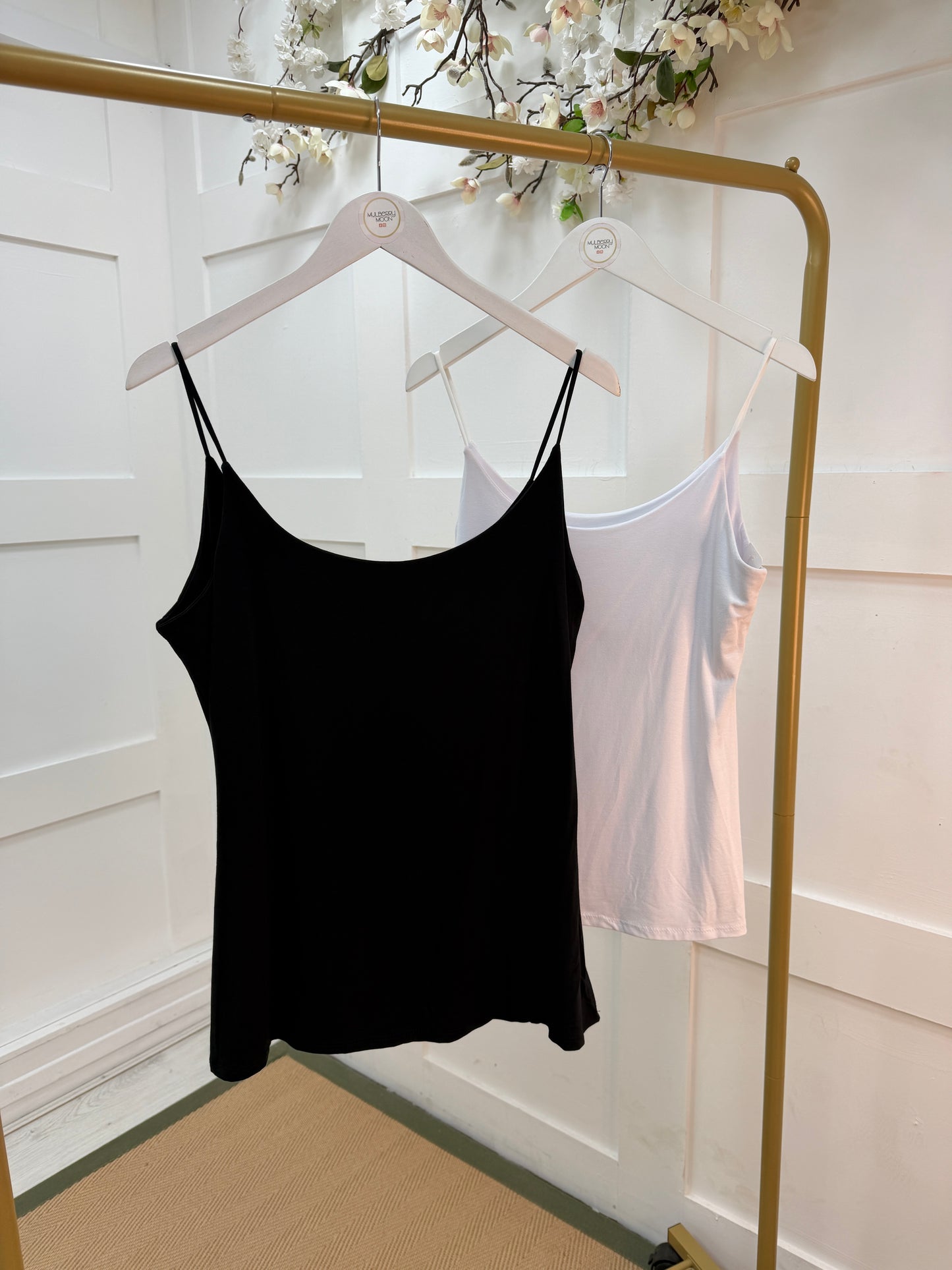 Velma: Black stretchy vest top. 2 sizes