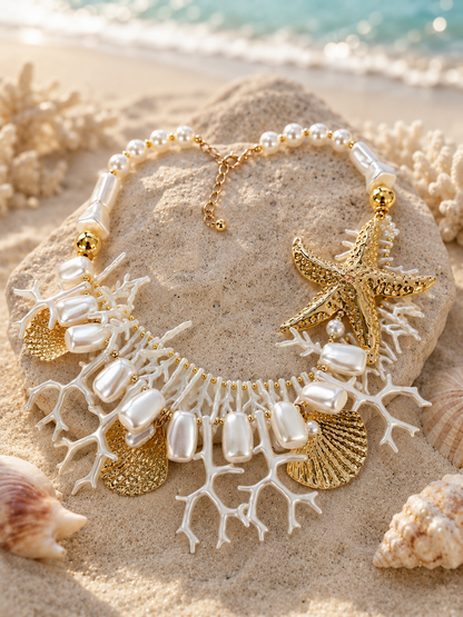 Azoria: Chunky white coral & gold starfish necklace
