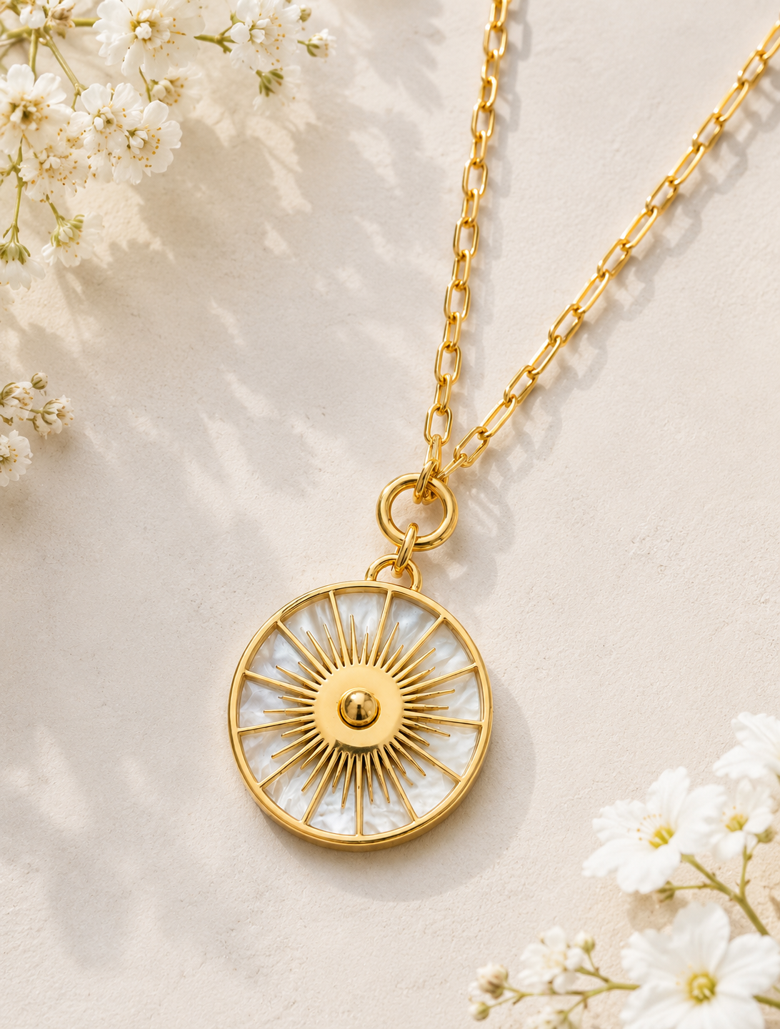 Solique: Gold mother of pearl sundial necklace
