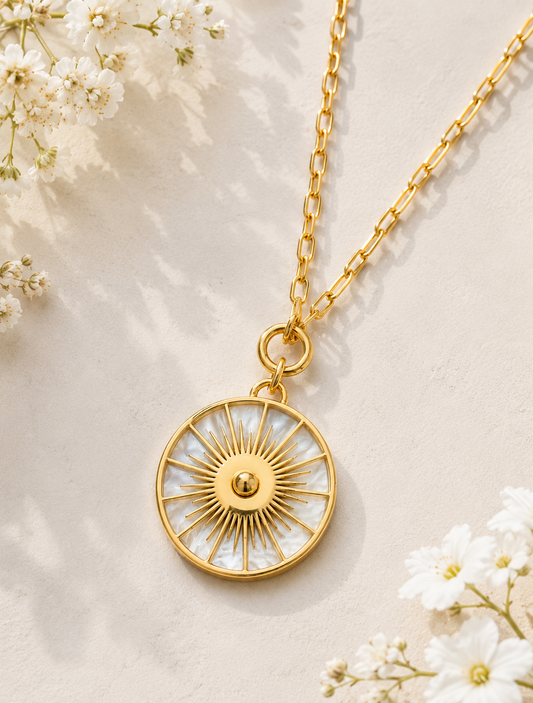 Solique: Gold mother of pearl sundial necklace