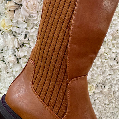 Trova Tan stretchy knee high boots. Sizes 3-8